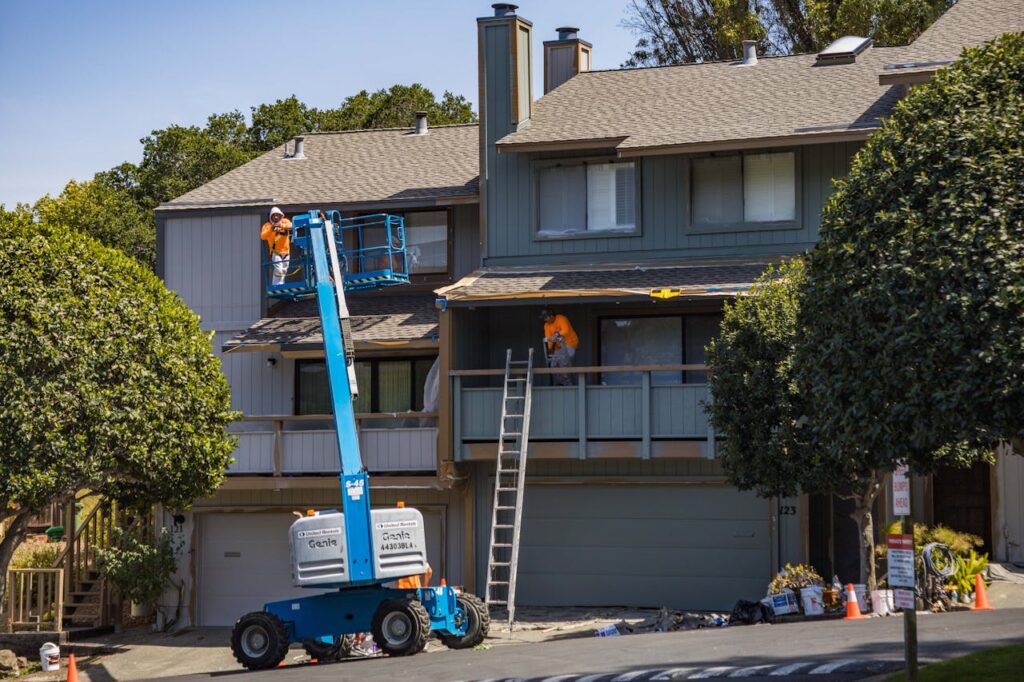 Exterior building envelope reparation with boomlift